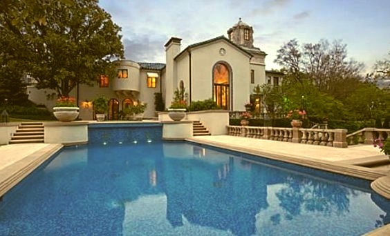 Pool Outside of a Mansion