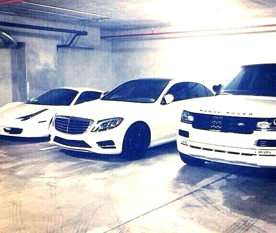 White Ferrari, White S Class, and White Range Rover